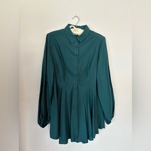 Super cute free people women’s tunic. Great with a pair of leggings.